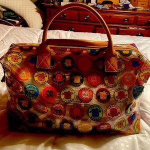 Luggage

Clear weekend bag with Rooney and Bourke symbols in variousrs colors.